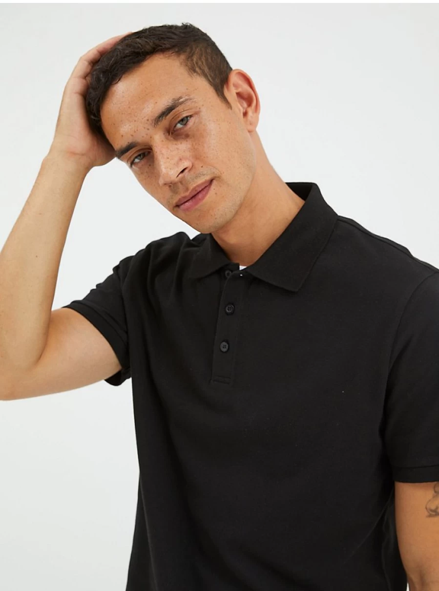 "George at Asda Boys' Black Plain Polo Shirt – Comfortable & Stylish Top for Kids"