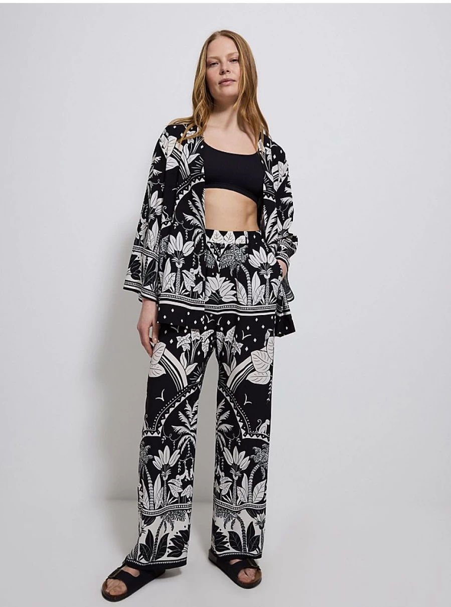 "George at Asda Women's Abstract Print Palm Wide Leg Trousers – Comfort & Style"